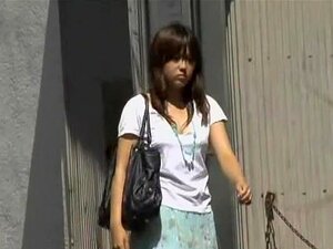 Asian girl in a white blouse got skirt sharked by some man