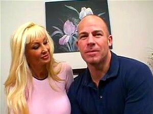 Fake Tits And Tan Lined MILF Gets A Facial From Hubby.