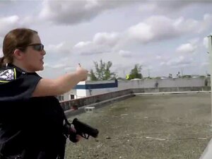 Naughty Computer Thief Is Taken To A Rooftop By Perverted Milf Cops