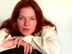 Busty Redhead Peels Off Her Clothes And Flaunts Her Curves