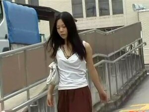 Street sharking of a cute Japanese girl wearing a dress